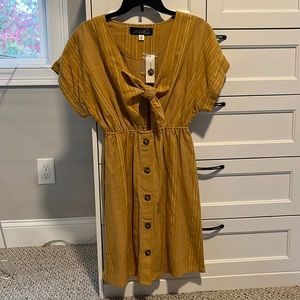 Women’s peep hole tie dress